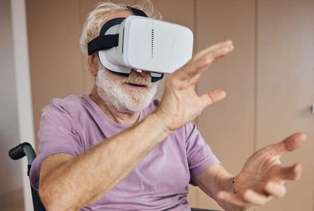 Man using VR headset in Care Home